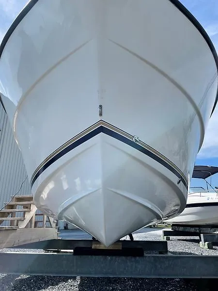 Slide: The Image of 2001 Shamrock 270 Open boat on trailer, viewed from the front. - 16