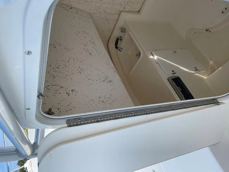 Slide: The Image of 2001 Shamrock 270 Open boat interior, featuring a compact cabin space. - 20