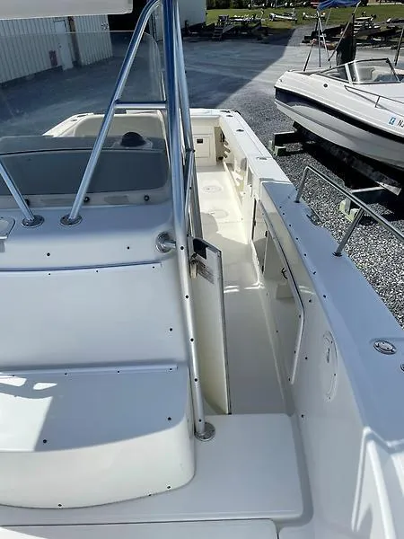 Slide: The Image of 2001 Shamrock 270 Open boat interior, featuring spacious deck and seating area. - 30