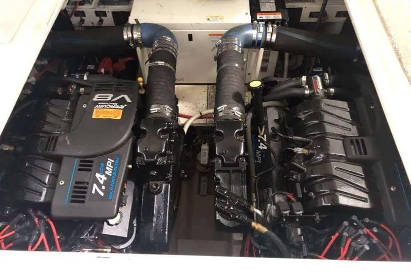 Slide: The Image of Engine compartment of 2001 Cruisers Yachts 3470 Express with dual V8 7.4 MPI engines. - 14