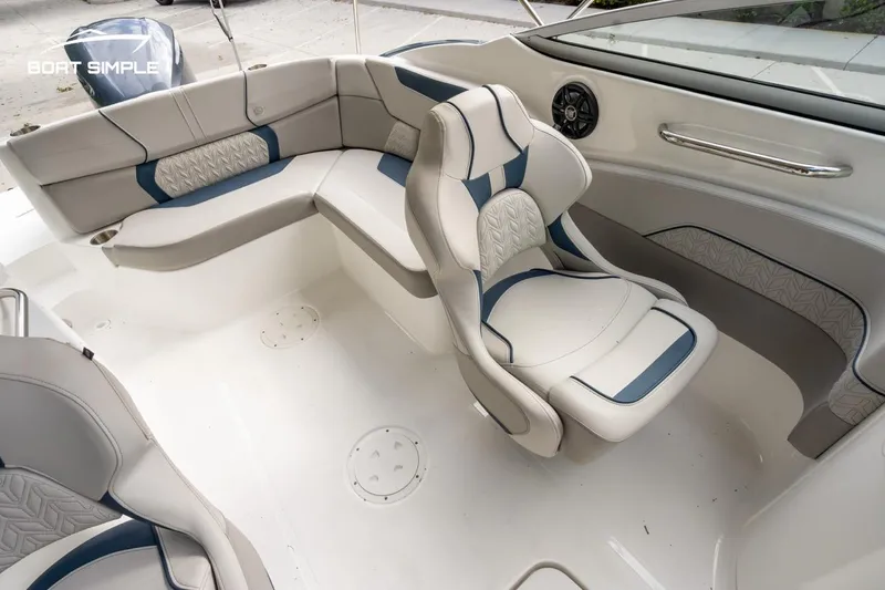 Slide: The Image of 2025 Hurricane SunDeck 2400 OB boat interior with stylish seating and modern design. - 15
