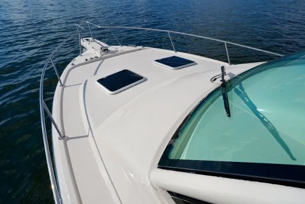 Slide: The Image of 2016 Grady-White Express 330 boat with radar and horn on open sea. - 11