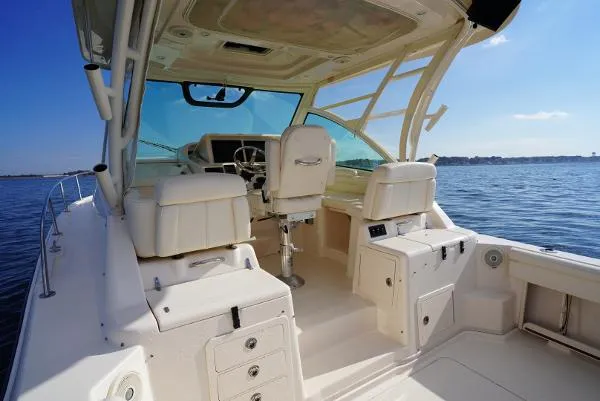 Slide: The Image of 2016 Grady-White Express 330 boat deck with anchor, railing, and ocean view. - 14