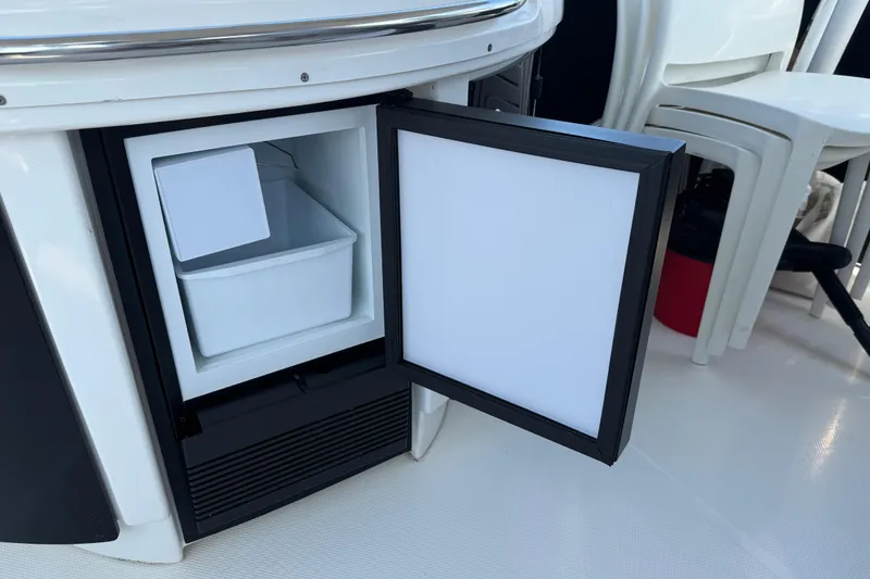 Slide: The Image of Open mini fridge on 2001 Bayliner 4087 Aft Cabin Motoryacht deck. - 34