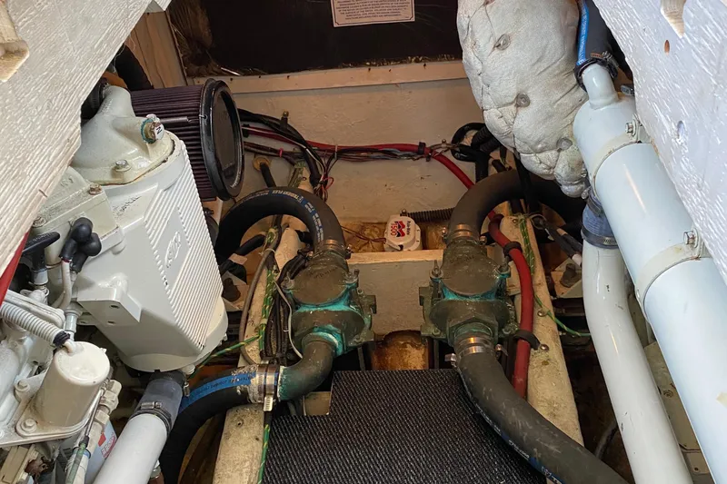 Slide: The Image of Engine room of 2001 Bayliner 4087 Aft Cabin Motoryacht with visible components and wiring. - 35