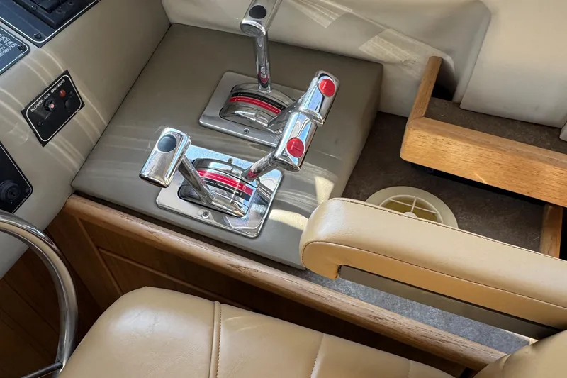 Slide: The Image of Control panel of a 2001 Bayliner 4087 Aft Cabin Motoryacht with throttle levers. - 42