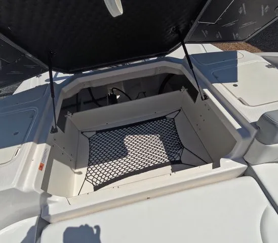 Slide: The Image of Storage compartment in Chaparral 23 SSi OB boat, 2026 model. - 11