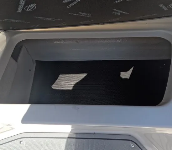 Slide: The Image of Interior of 2026 Chaparral 23 SSi OB with storage compartment. - 15