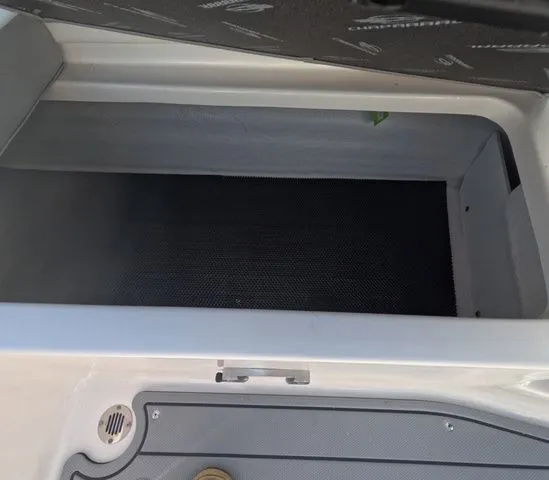 Slide: The Image of Interior of 2026 Chaparral 23 SSi OB with storage compartment. - 16