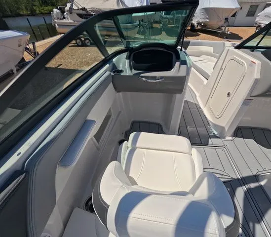 Slide: The Image of Interior of 2026 Chaparral 23 SSi OB with luxurious seating. - 17