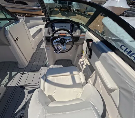 Slide: The Image of Interior of 2026 Chaparral 23 SSi OB with steering wheel and seats. - 18