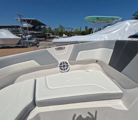 Slide: The Image of Interior of 2026 Chaparral 23 SSi OB with luxurious seating. - 27