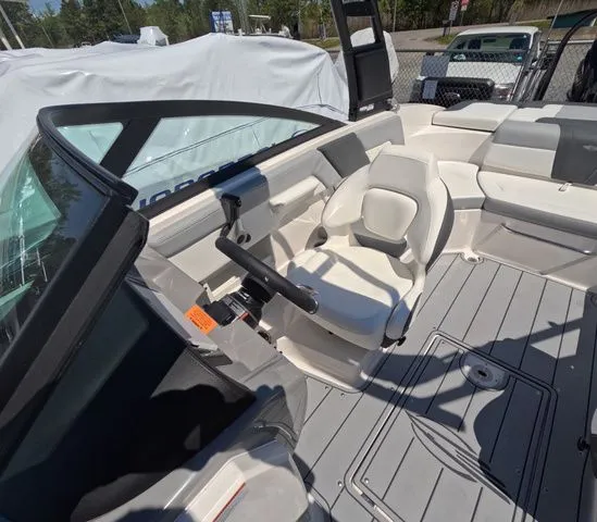 Slide: The Image of Interior of 2026 Chaparral 23 SSi OB with seating and controls. - 36