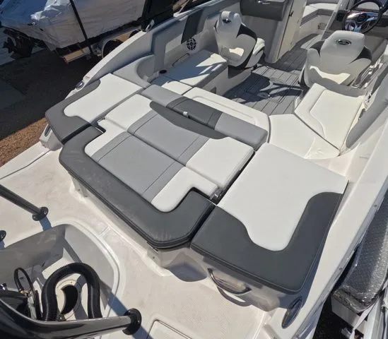 Slide: The Image of Interior of 2026 Chaparral 23 SSi OB with gray and white seating. - 9