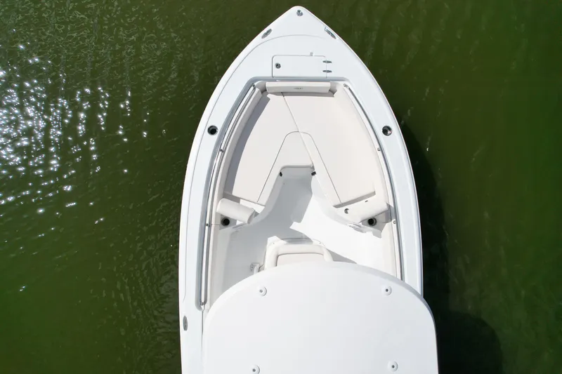 Slide: The Image of Top view of 2025 Sea Hunt Ultra 229 boat on green water. - 3