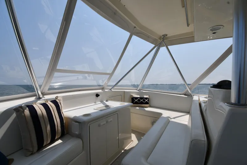 Slide: The Image of Interior of 1996 Ocean Yachts 53 Super Sport with panoramic windows and seating. - 20