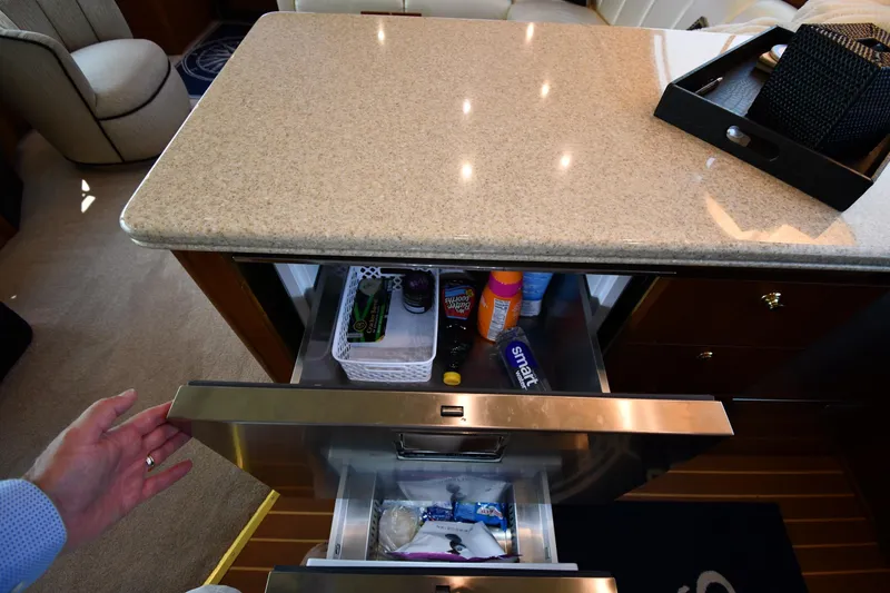 Slide: The Image of Kitchen drawer in 1996 Ocean Yachts 53 Super Sport, featuring storage and countertop. - 51