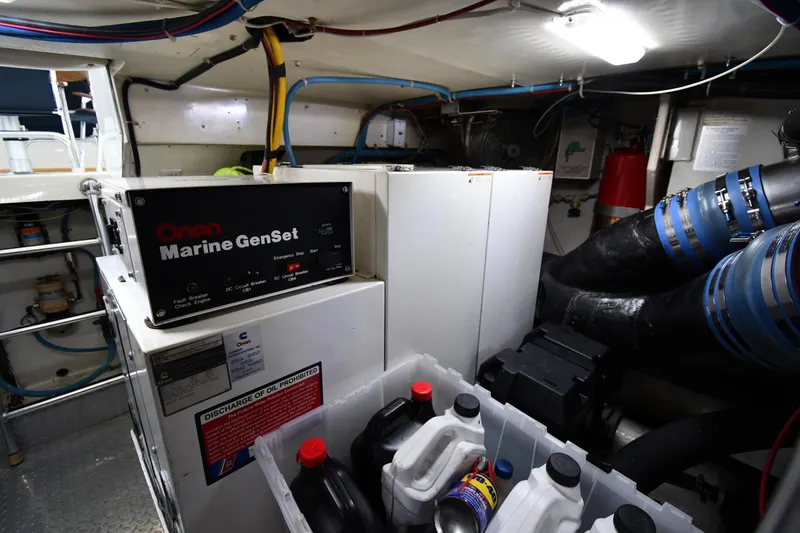 Slide: The Image of Engine room of 1996 Ocean Yachts 53 Super Sport with Onan Marine GenSet. - 68