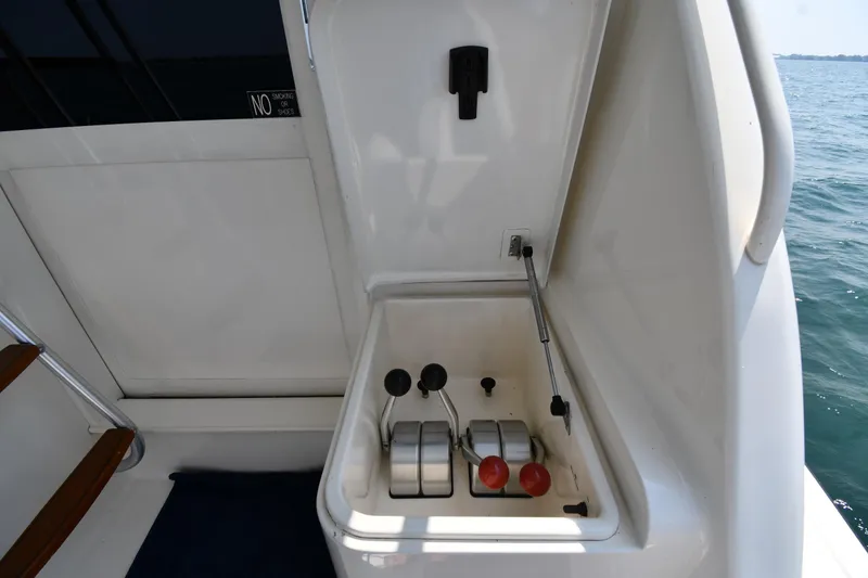 Slide: The Image of Control panel of a 1996 Ocean Yachts 53 Super Sport, overlooking the sea. - 9