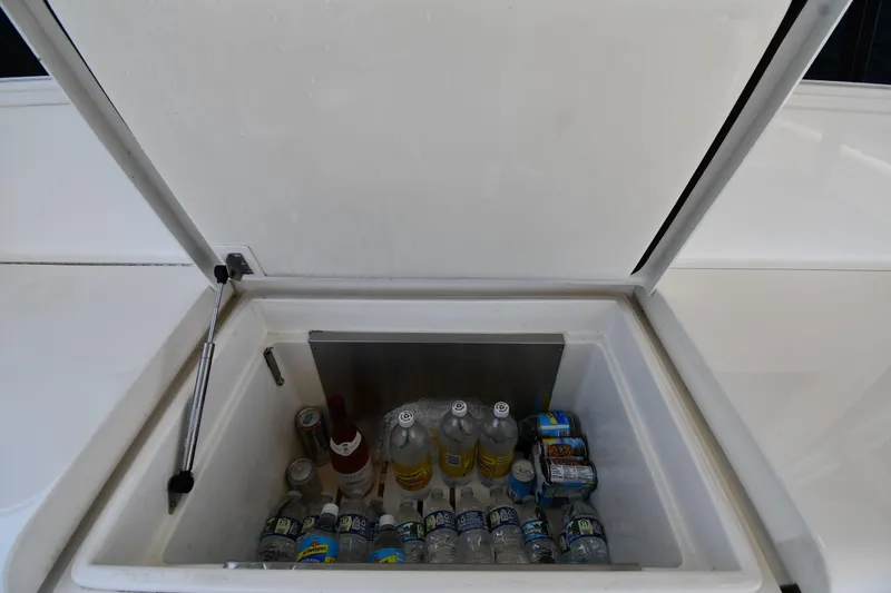 Slide: The Image of Open cooler on 1996 Ocean Yachts 53 Super Sport, stocked with beverages and ice. - 11
