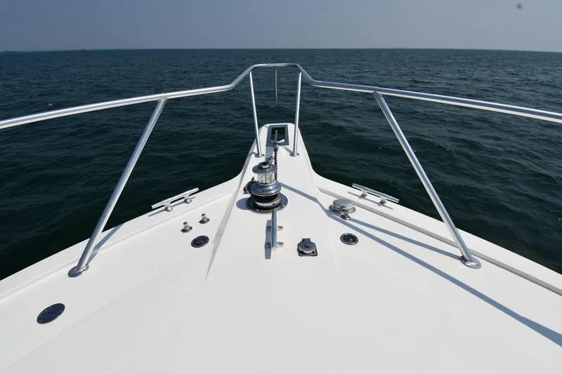 Slide: The Image of Bow view of 1996 Ocean Yachts 53 Super Sport on open water. - 2