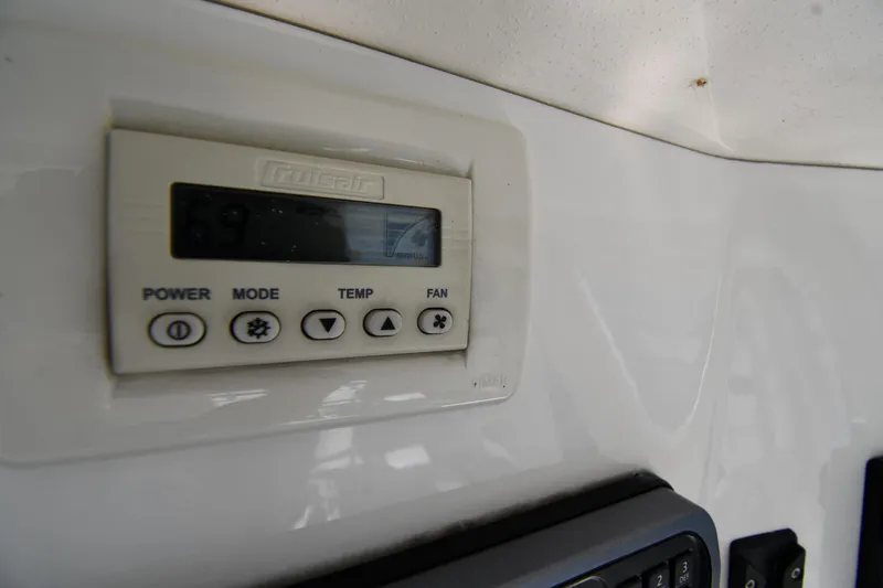 Slide: The Image of Thermostat control panel on 1996 Ocean Yachts 53 Super Sport boat interior. - 22