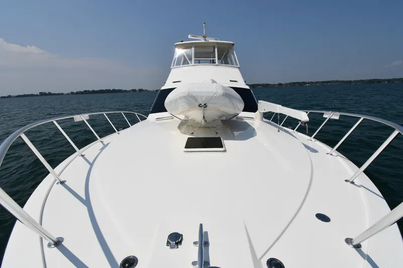 Slide: The Image of 1996 Ocean Yachts 53 Super Sport on open water, showcasing sleek deck design. - 3