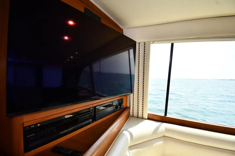 Slide: The Image of Interior of 1996 Ocean Yachts 53 Super Sport with TV and ocean view. - 58