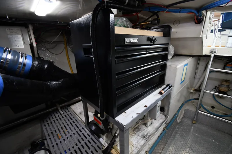 Slide: The Image of Engine room of 1996 Ocean Yachts 53 Super Sport with tool chest and equipment. - 72