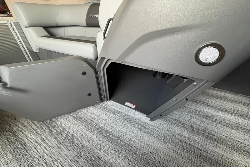 Slide: The Image of Interior of 2026 Bennington 168 SL Electric boat with open storage compartment. - 10