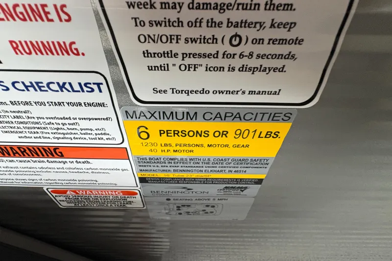 Slide: The Image of 2026 Bennington 168 SL Electric capacity label: 6 persons or 901 lbs, 40 HP motor. - 13