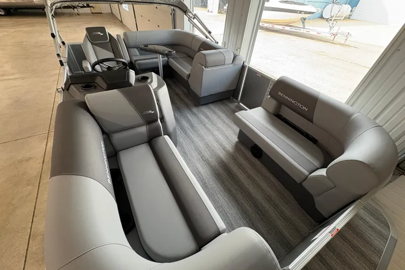 Slide: The Image of 2026 Bennington 168 SL Electric pontoon boat interior with gray seating and modern design. - 5