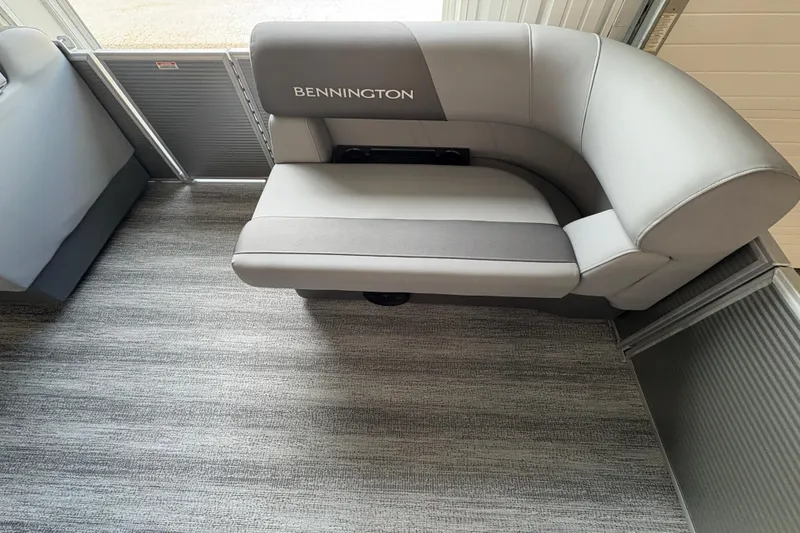 Slide: The Image of 2026 Bennington 168 SL Electric boat interior with gray seating and modern design. - 7