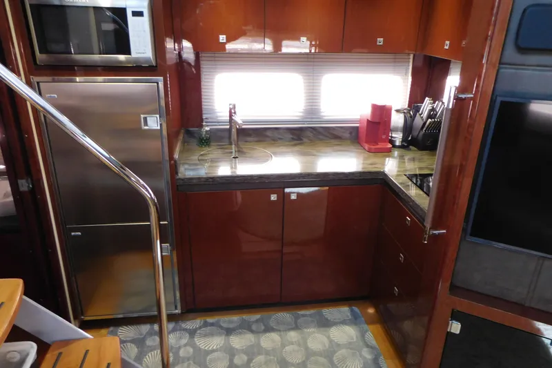 Slide: The Image of Luxurious kitchen interior of 2013 Sea Ray 510 Sundancer yacht with modern appliances. - 50
