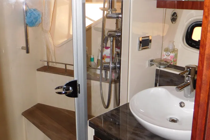 Slide: The Image of Luxurious bathroom in 2013 Sea Ray 510 Sundancer yacht with modern fixtures. - 56