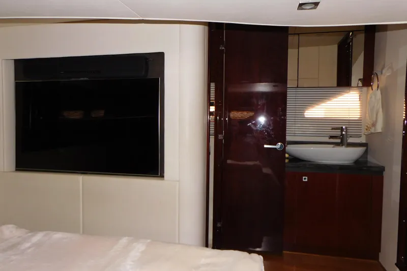Slide: The Image of Luxurious interior of 2013 Sea Ray 510 Sundancer yacht with modern bathroom and TV. - 61