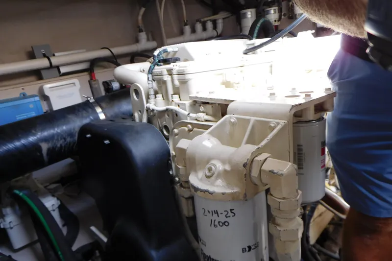 Slide: The Image of Engine room of 2013 Sea Ray 510 Sundancer with visible machinery and components. - 82