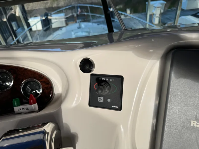 Slide: The Image of Control panel of 2001 Sea Ray 420 Aft Cabin boat with thruster joystick. - 24