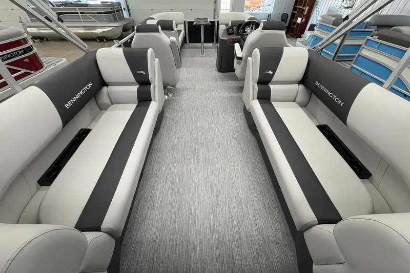 Slide: The Image of 2026 Bennington 22 SSR Stern Radius SNAP pontoon boat interior with plush seating. - 16