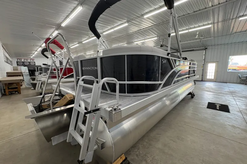 Slide: The Image of 2026 Bennington 22 SSR Stern Radius SNAP pontoon boat in showroom. - 4