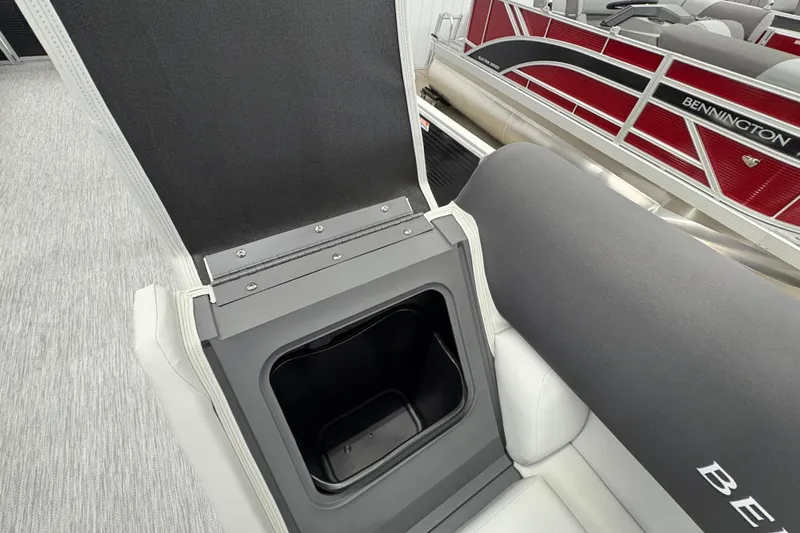 Slide: The Image of Open storage compartment on 2026 Bennington 22 SSR Stern Radius SNAP boat. - 8