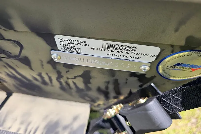 Slide: The Image of 2026 Tracker Grizzly 1654 T Sportsman boat identification plate and certification sticker. - 18