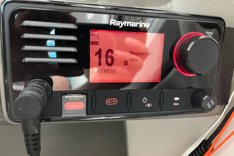 Slide: The Image of Raymarine marine radio display on 2007 Regal 3760 IB COMMODORE, showing distress signal. - 16