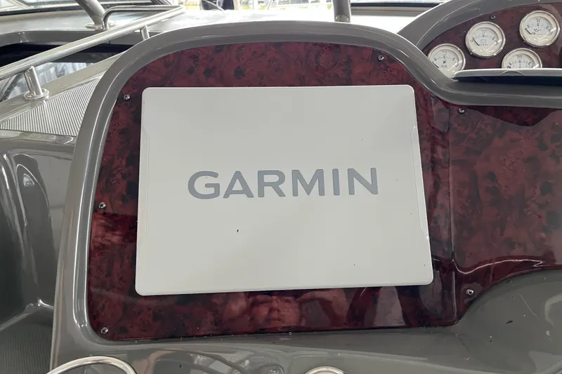 Slide: The Image of Garmin navigation system on 2007 Regal 3760 IB Commodore boat dashboard. - 18