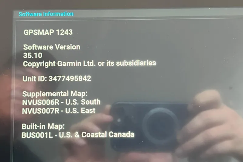 Slide: The Image of Display of Garmin GPSMAP 1243 software information on a 2007 Regal 3760 IB COMMODORE. - 19