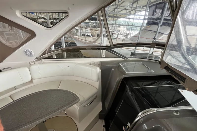 Slide: The Image of Interior of 2007 Regal 3760 IB Commodore yacht with seating and kitchenette. - 20