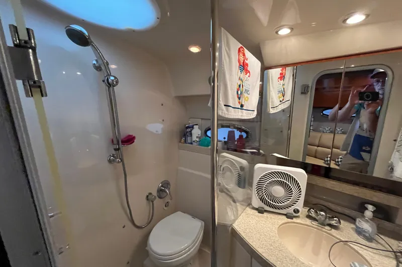 Slide: The Image of Bathroom interior of 2007 Regal 3760 IB Commodore yacht with shower and sink. - 32