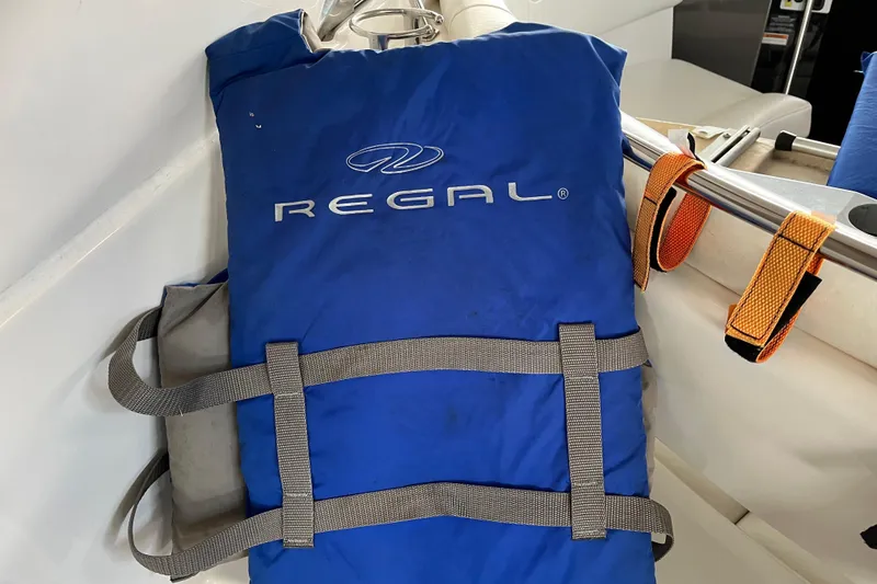 Slide: The Image of Blue Regal life jacket on a 2007 Regal 3760 IB Commodore boat. - 40