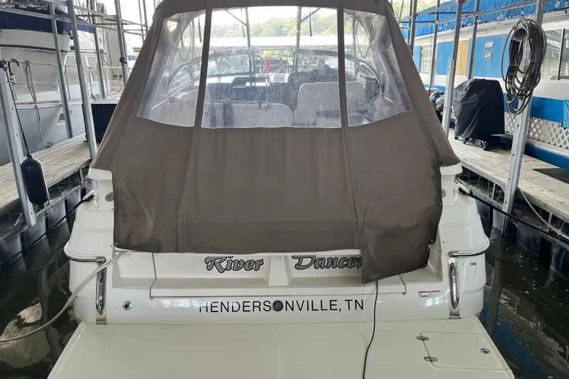 Slide: The Image of 2007 Regal 3760 IB COMMODORE boat docked, covered, with "River Dancer" name, Hendersonville, TN. - 6