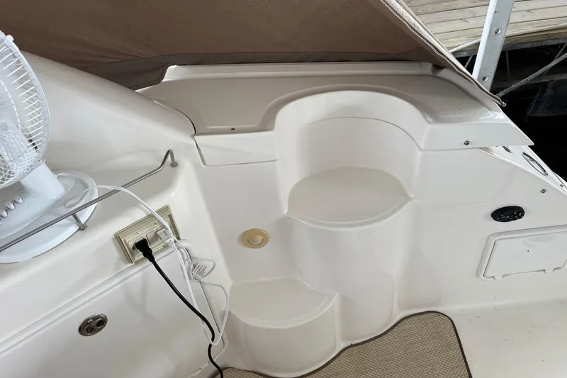 Slide: The Image of 2007 Regal 3760 IB Commodore boat interior with steps and electrical outlet. - 8